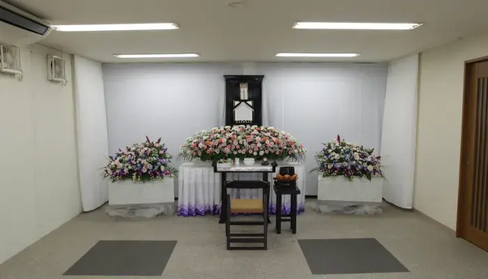 千里ホールで葬儀を行なった写真